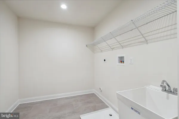 a bathroom with a sink and vanity