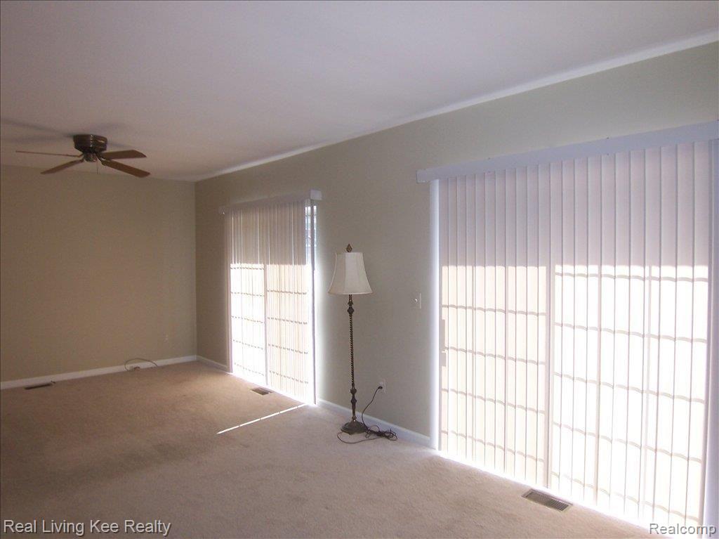 1467 Carriage Lane, Unit 94 Rochester, MI 48306 - Photo 13 of 19 Great Rm w/2 Doorwalls