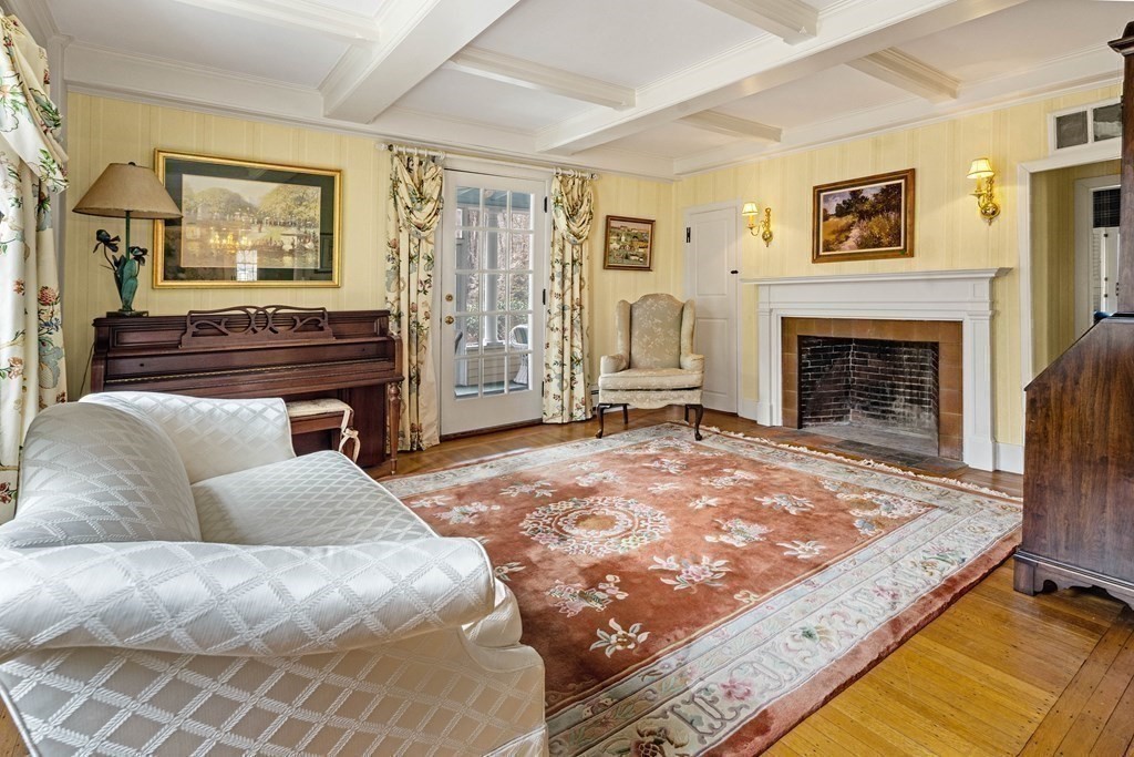 607 Broadway Hanover, MA 02339 - Photo 13 of 41 a bed room with a bed and a fireplace