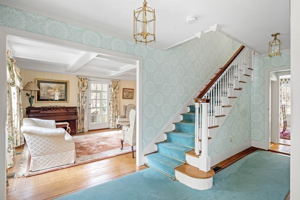 607 Broadway Hanover, MA 02339 - Photo 16 of 41 a view of entryway and hall with wooden floor