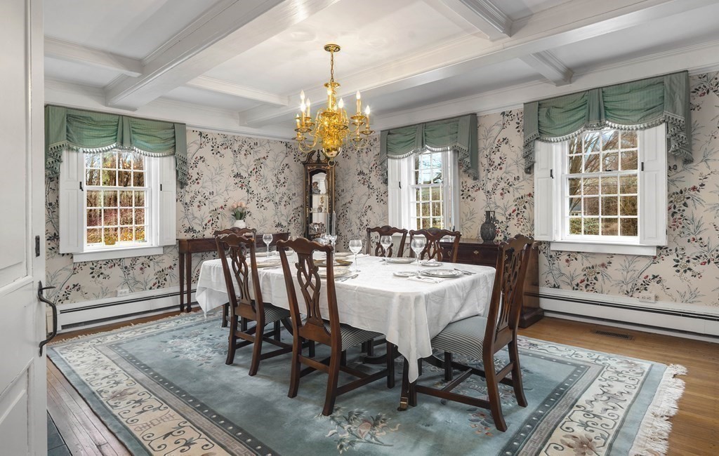 607 Broadway Hanover, MA 02339 - Photo 18 of 41 a view of a dining room with furniture window and wooden floor