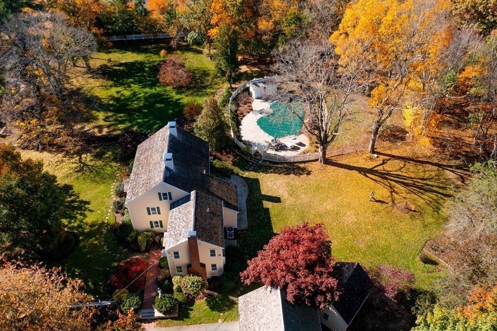 607 Broadway Hanover, MA 02339 - Photo 2 of 41 a aerial view of a house with a yard and lake view