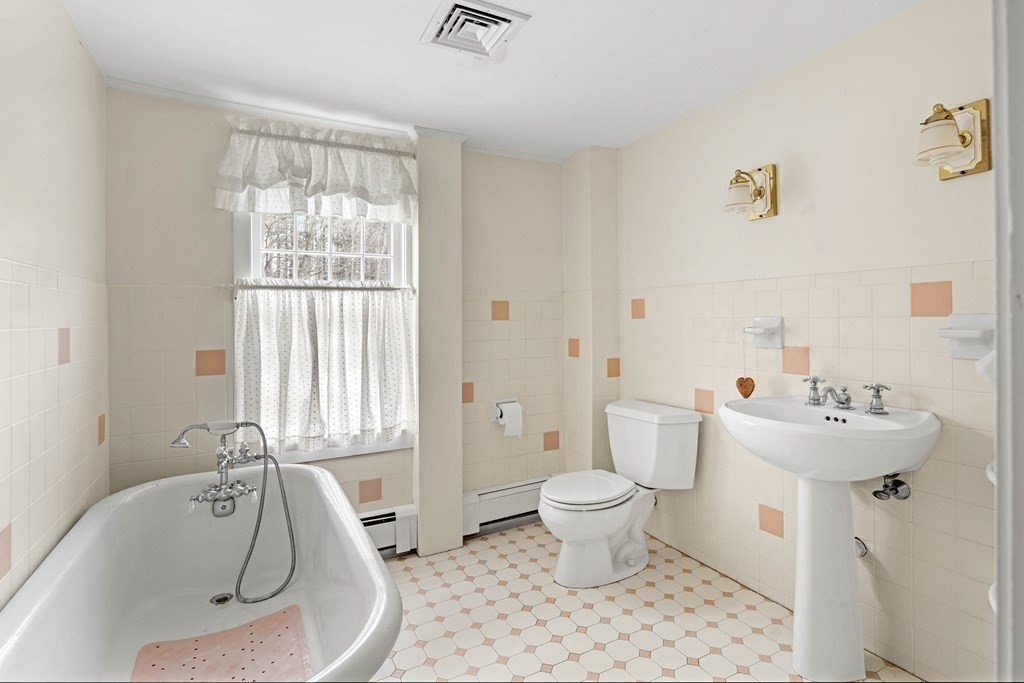 607 Broadway Hanover, MA 02339 - Photo 22 of 41 a bathroom with a sink toilet and shower