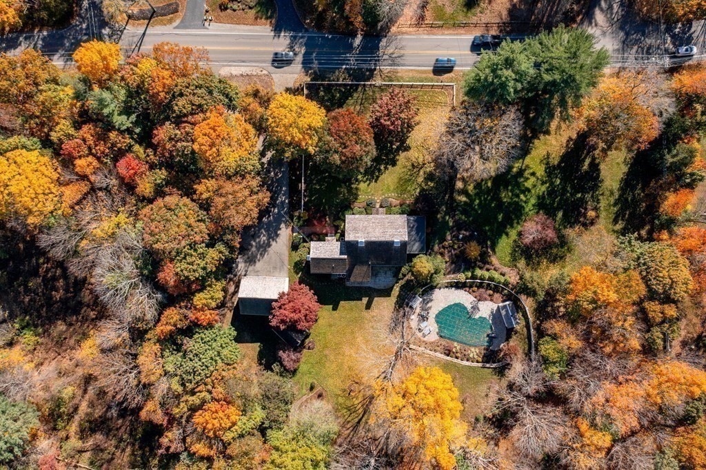607 Broadway Hanover, MA 02339 - Photo 40 of 41 an aerial view of a house with a yard and large trees
