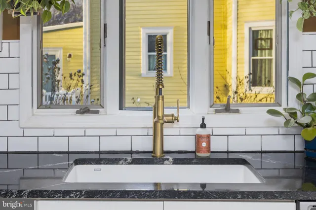 a bathroom with a bathtub and a sink