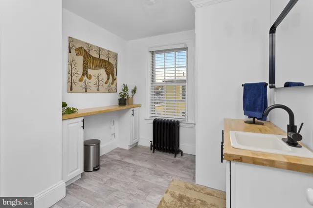 a view of kitchen and sink