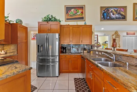 a living room with furniture workspace and a flat screen tv