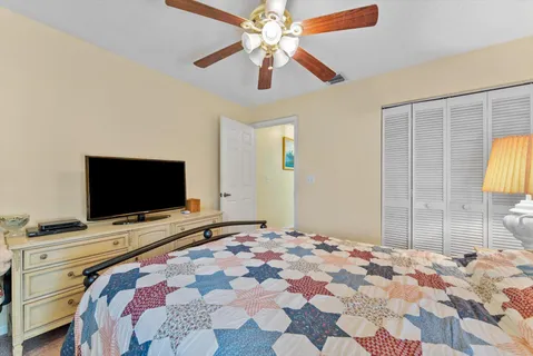 a view of swimming pool with a patio