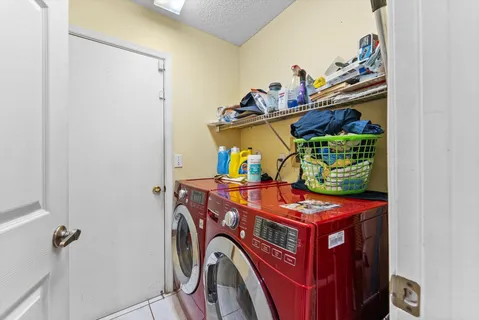 a view of a backyard with swimming pool
