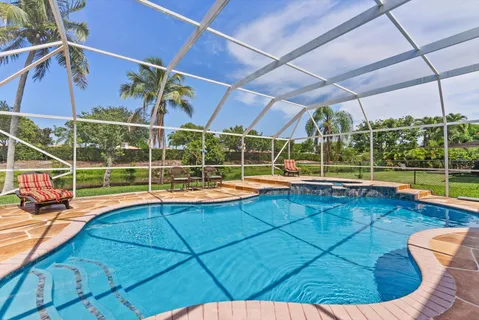 a view of a house with a big yard