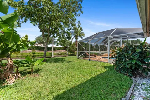 an aerial view of a house with a garden