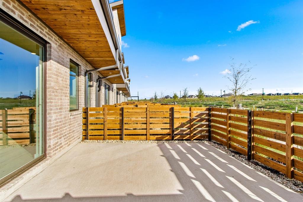 2028 Aldrich Road Celina, TX 75009 - Photo 2 of 40 a view of a pathway with a building in the background