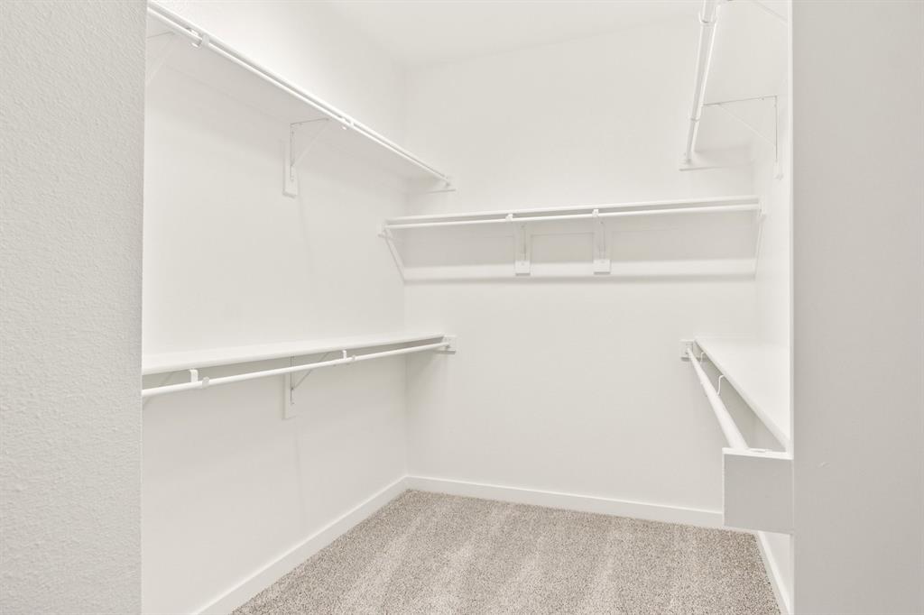 2028 Aldrich Road Celina, TX 75009 - Photo 28 of 40 a view of an empty walk in closet