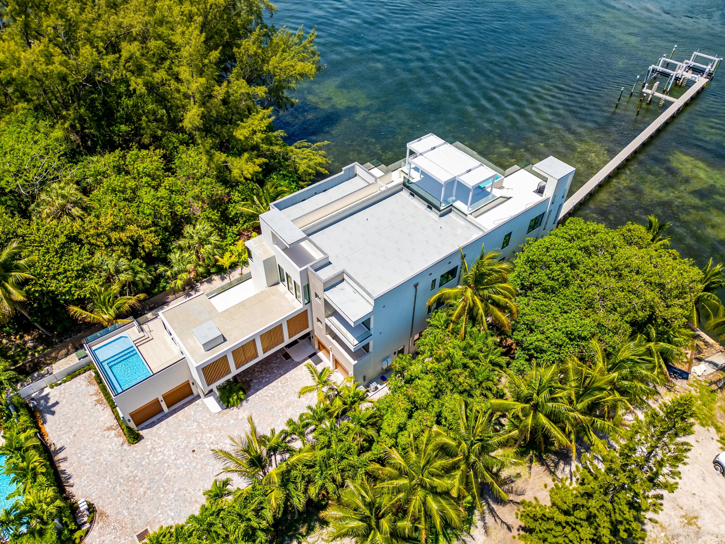 900 Lago Mar Lane, Unit PH Boca Raton, FL 33431 - Photo 56 of 58 an aerial view of a house with a yard