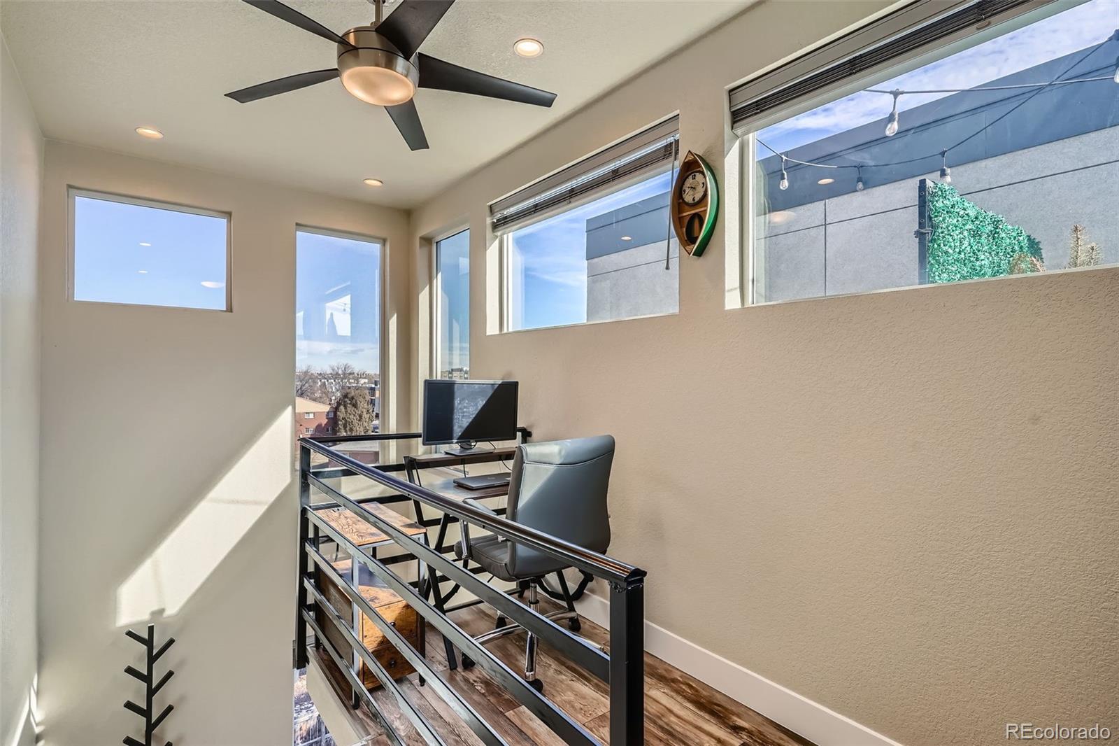 1583 Grove Street, Unit 5 Denver, CO 80204 - Photo 24 of 39 a view of a workspace with furniture