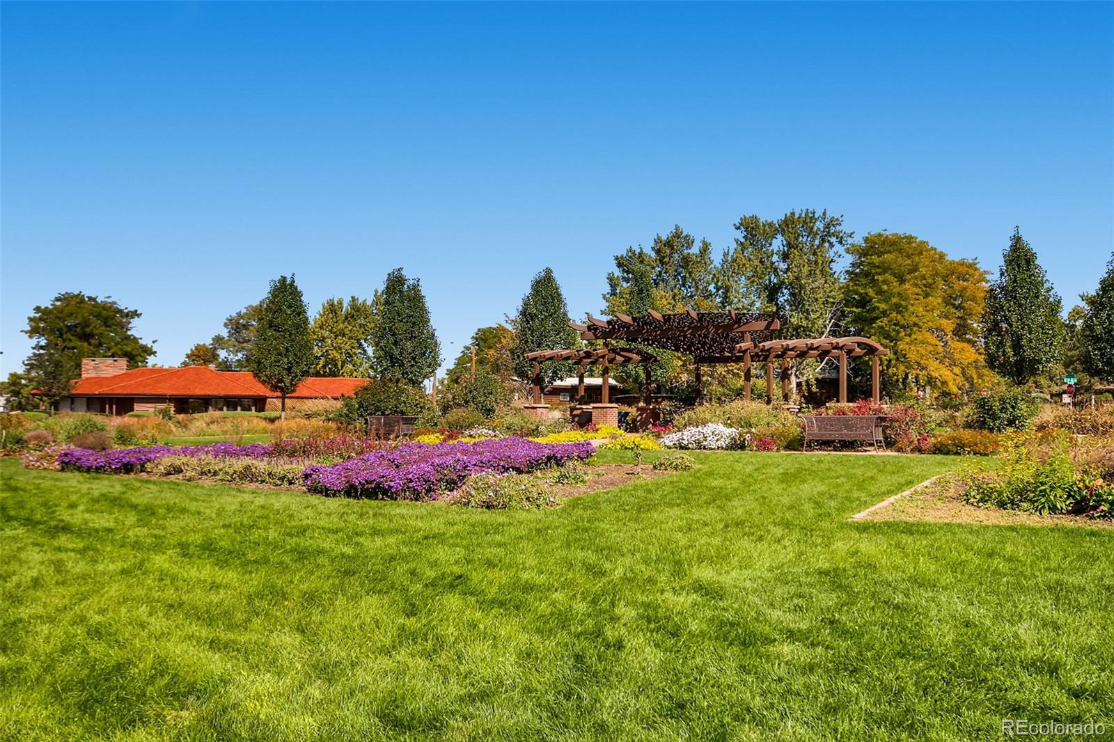 1583 Grove Street, Unit 5 Denver, CO 80204 - Photo 29 of 39 a front view of a house with a garden