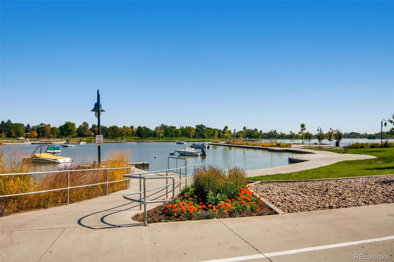 1583 Grove Street, Unit 5 Denver, CO 80204 - Photo 35 of 39 a view of a lake with a house