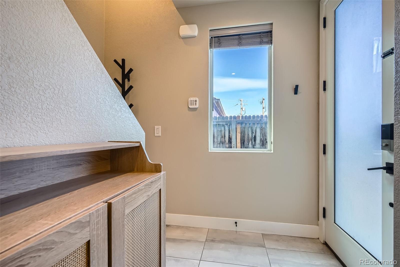 1583 Grove Street, Unit 5 Denver, CO 80204 - Photo 5 of 39 a view of an entryway with staircase
