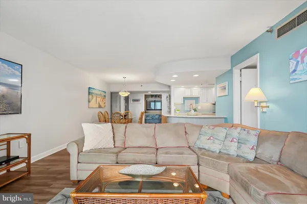 a bedroom with a bed and a lamp