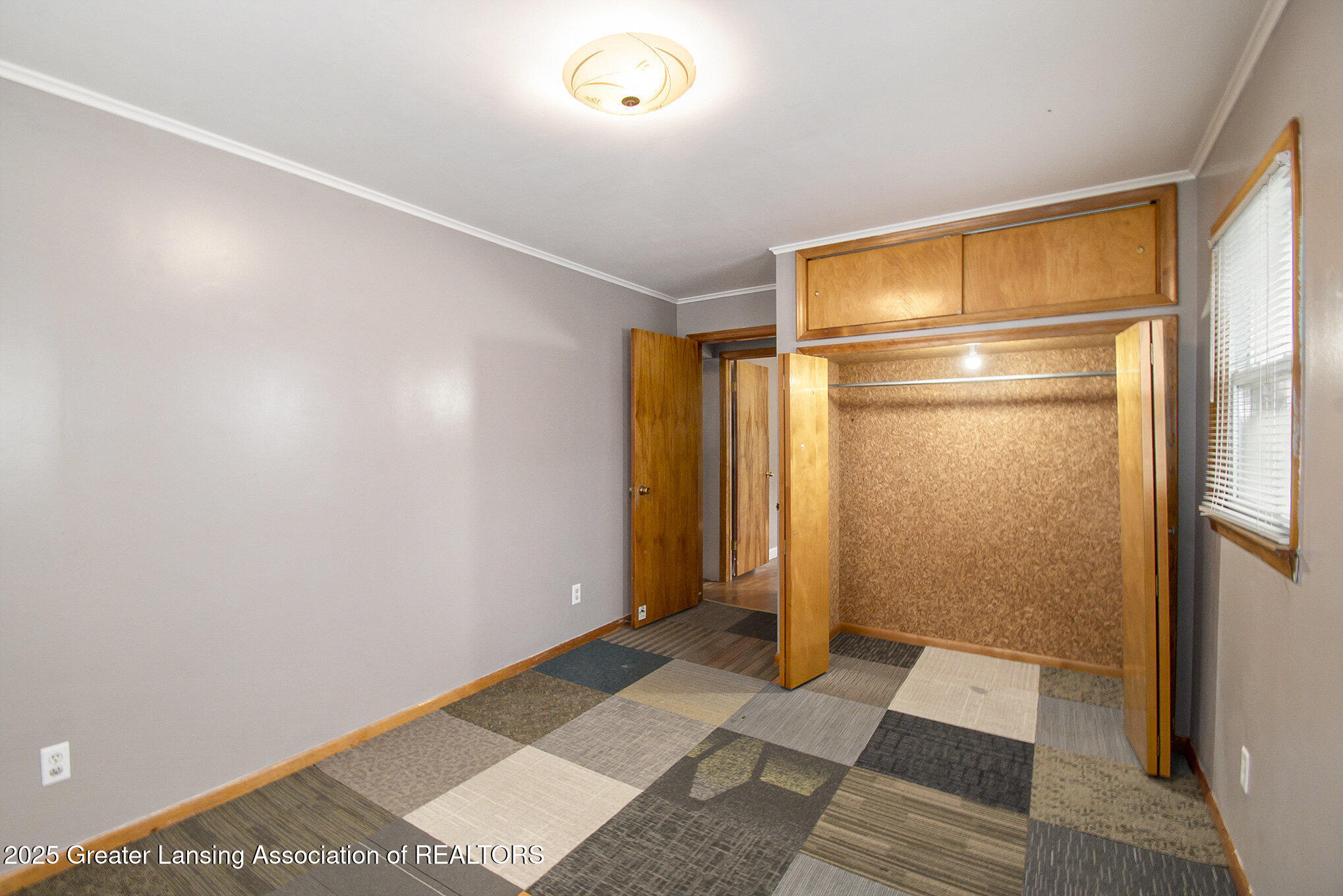 712 West Sheridan Road Lansing, MI 48906 - Photo 6 of 16 Primary Bedroom