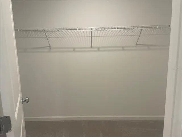 a view of small space with racks on the wall