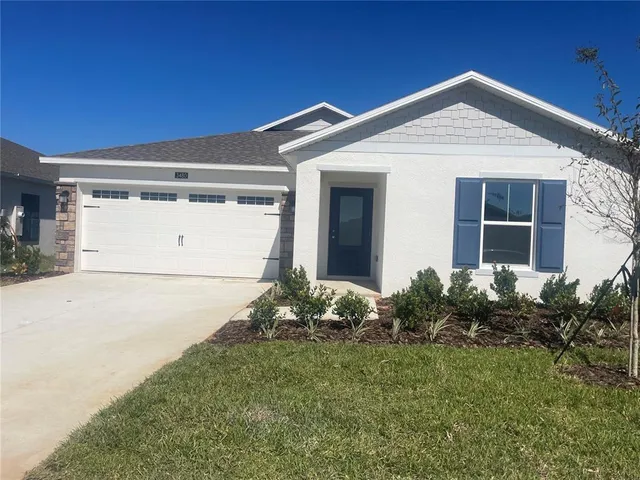 a front view of house with yard