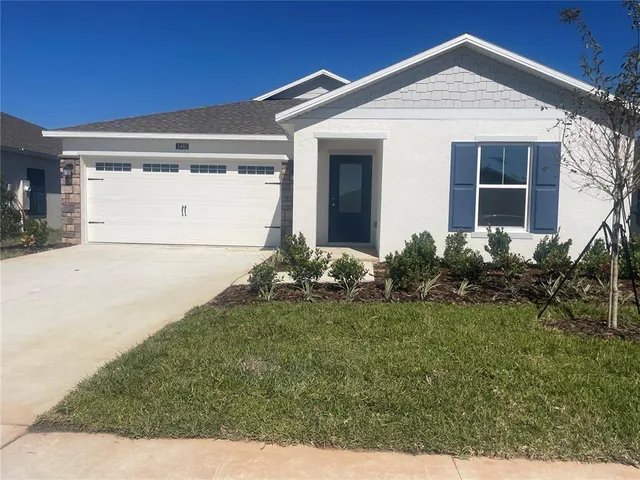 a front view of house with yard
