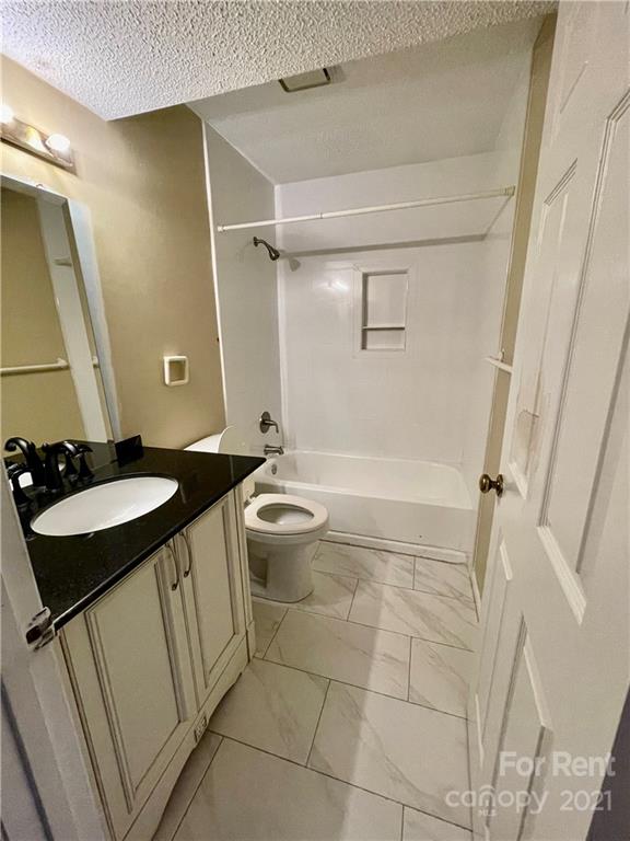 11046 Running Ridge Road Charlotte, NC 28226 - Photo 14 of 15 a bathroom with a sink and mirror