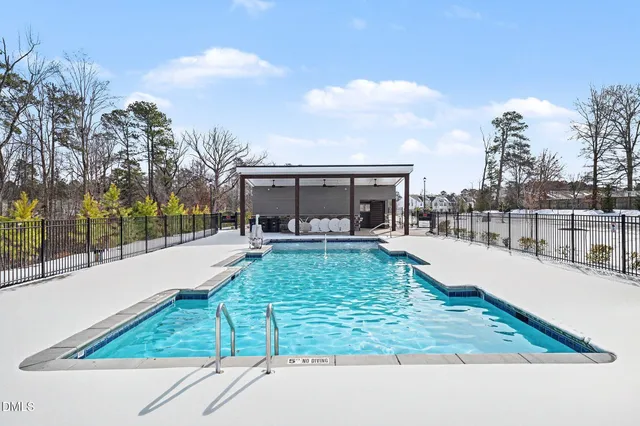 a view of a yard with trees