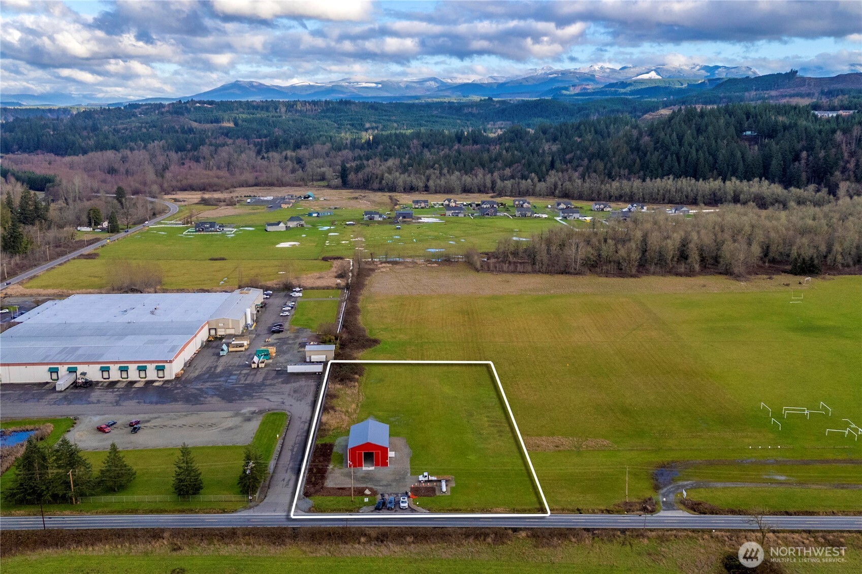 19403 Orville Road East Orting, WA 98360 - Photo 3 of 15 a view of swimming pool with a yard