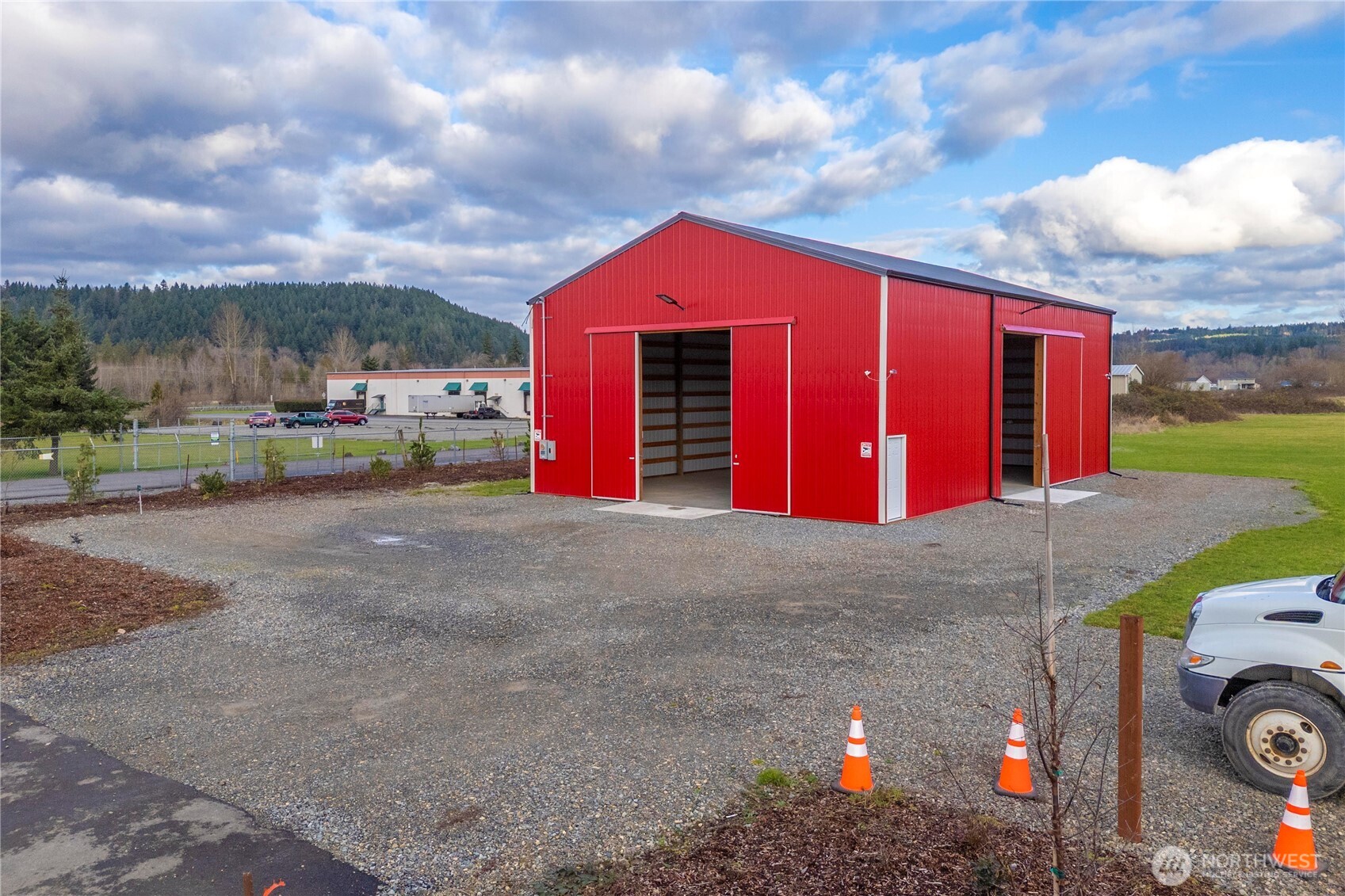 19403 Orville Road East Orting, WA 98360 - Photo 6 of 15 a view of a house with outdoor space