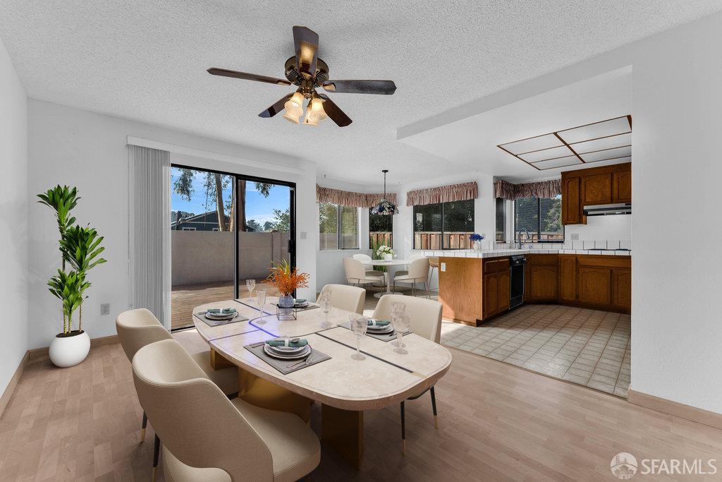 184 Pearce Hercules, CA 94547 - Photo 15 of 61 a living room with furniture kitchen view and a chandelier