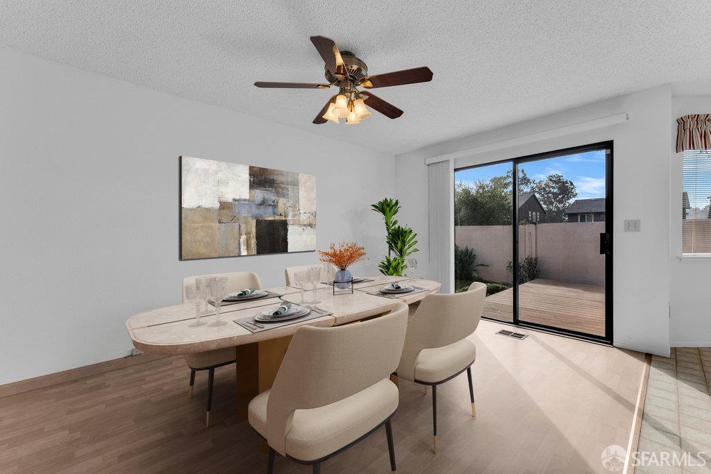 184 Pearce Hercules, CA 94547 - Photo 19 of 61 a dining room with furniture and a window
