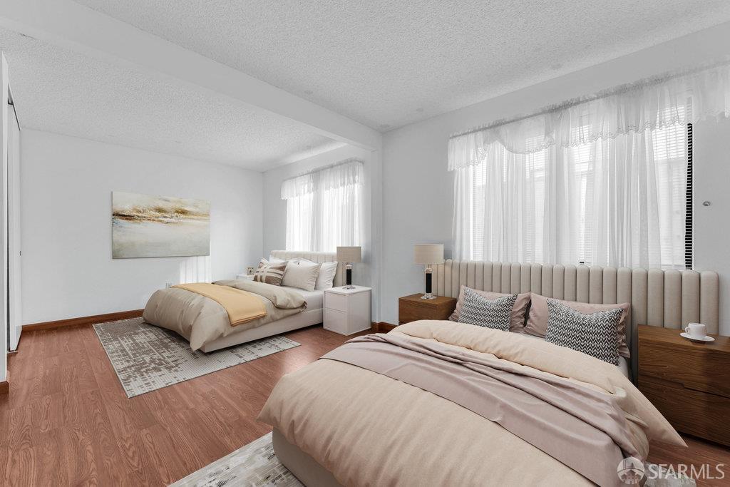 184 Pearce Hercules, CA 94547 - Photo 38 of 61 a bedroom with two beds and a large window