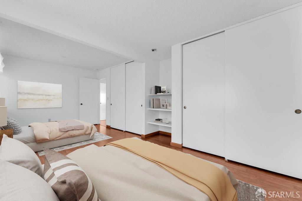 184 Pearce Hercules, CA 94547 - Photo 40 of 61 a bedroom with a bed and a cabinets