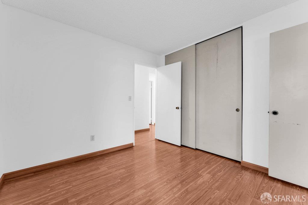 184 Pearce Hercules, CA 94547 - Photo 45 of 61 a view of an empty room and wooden floor