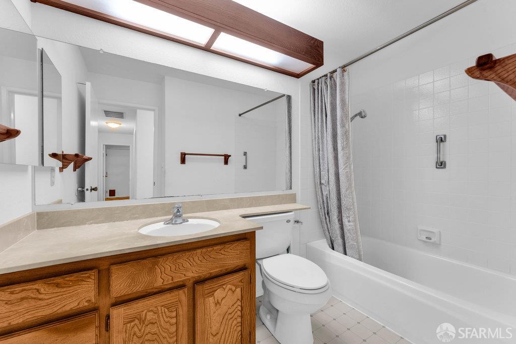 184 Pearce Hercules, CA 94547 - Photo 46 of 61 a bathroom with a sink a toilet and shower