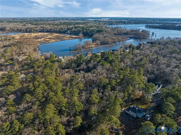 an aerial view of residential building and ocean