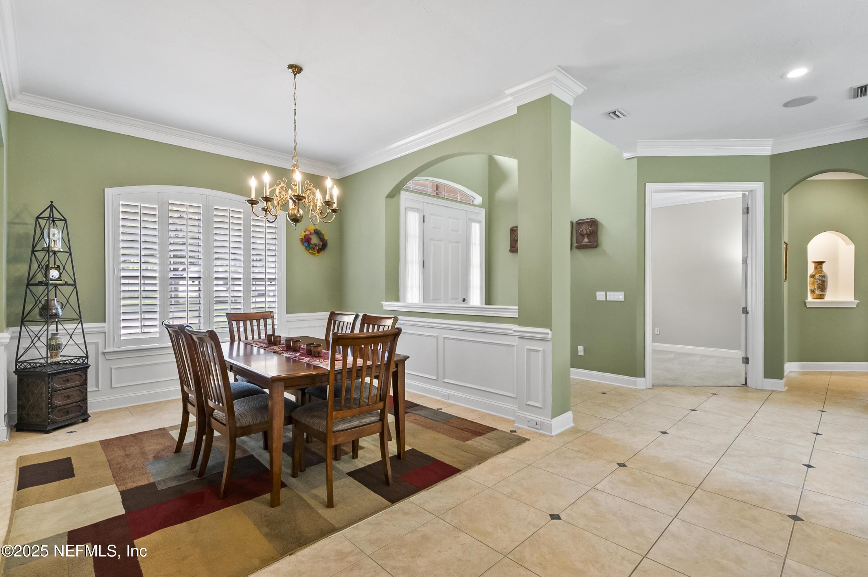 649 Treehouse Circle St. Augustine, FL 32095 - Photo 13 of 207 Custom Tile Foyer & Dining