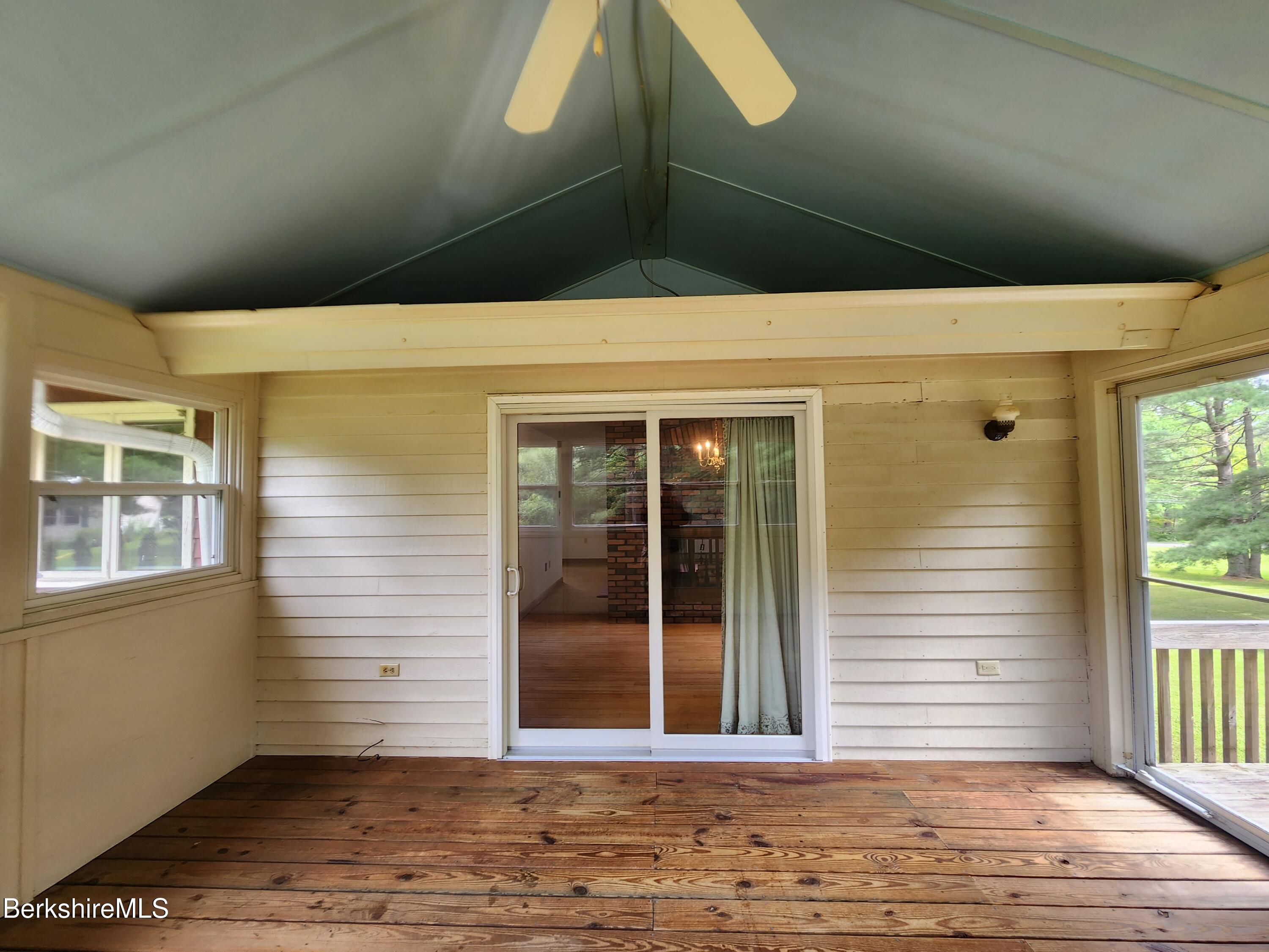 13 Glendale Middle Road Stockbridge, MA 01262 - Photo 29 of 43 Deck to house view with storage loft