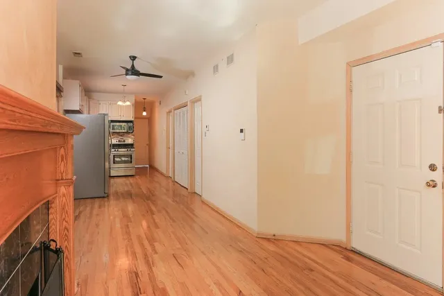 a view of an empty room with a window