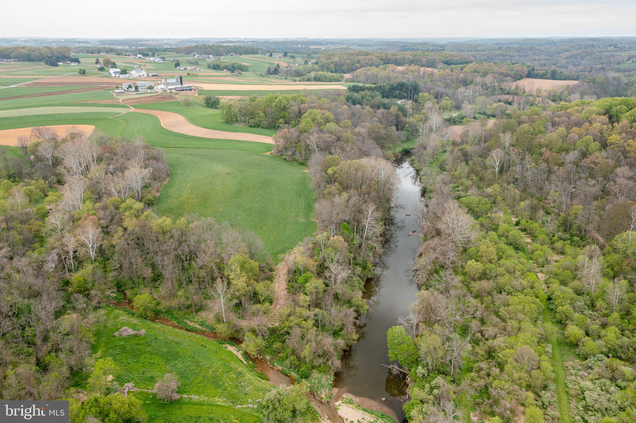 45 Latham Road Nottingham, PA 19362 - Photo 80 of 83 Serene river winding through lush fields.