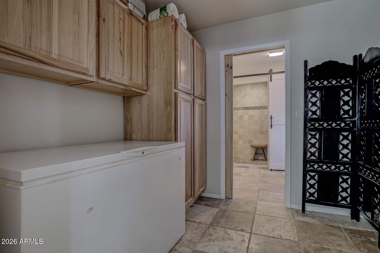 3762 Watertank Road Pine, AZ 85544 - Photo 23 of 38 a view of cabinets with wooden floor