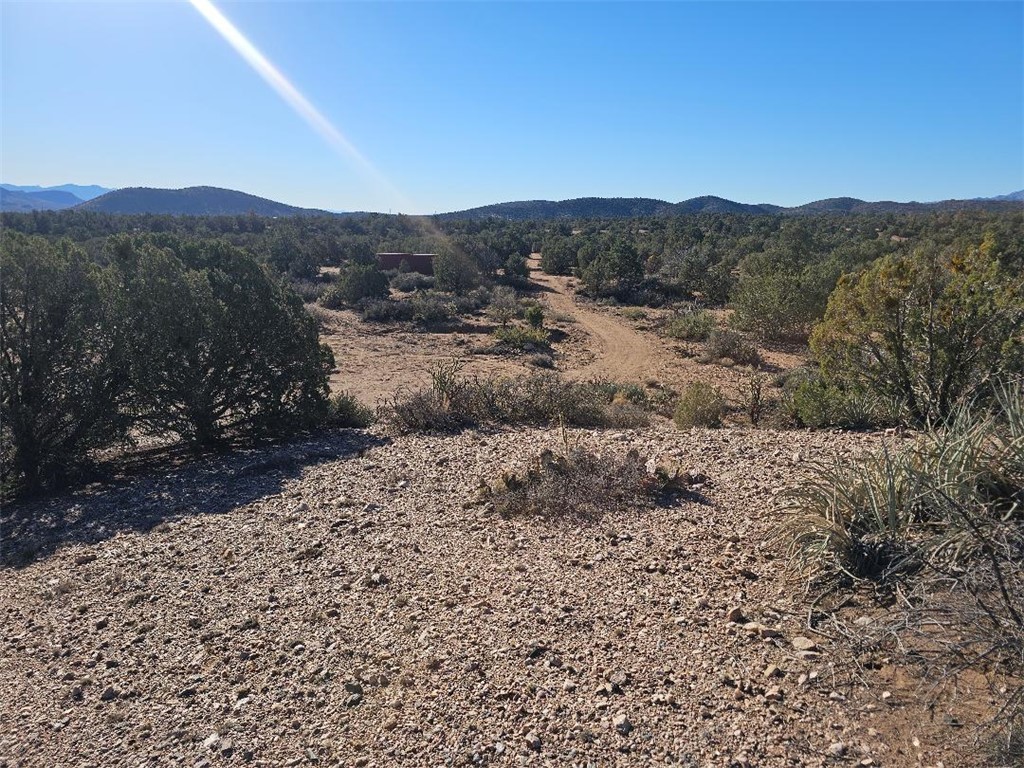 0 Austin Loop Kingman, AZ 86411 - Photo 4 of 7 a view of a dry yard with mountains in the background