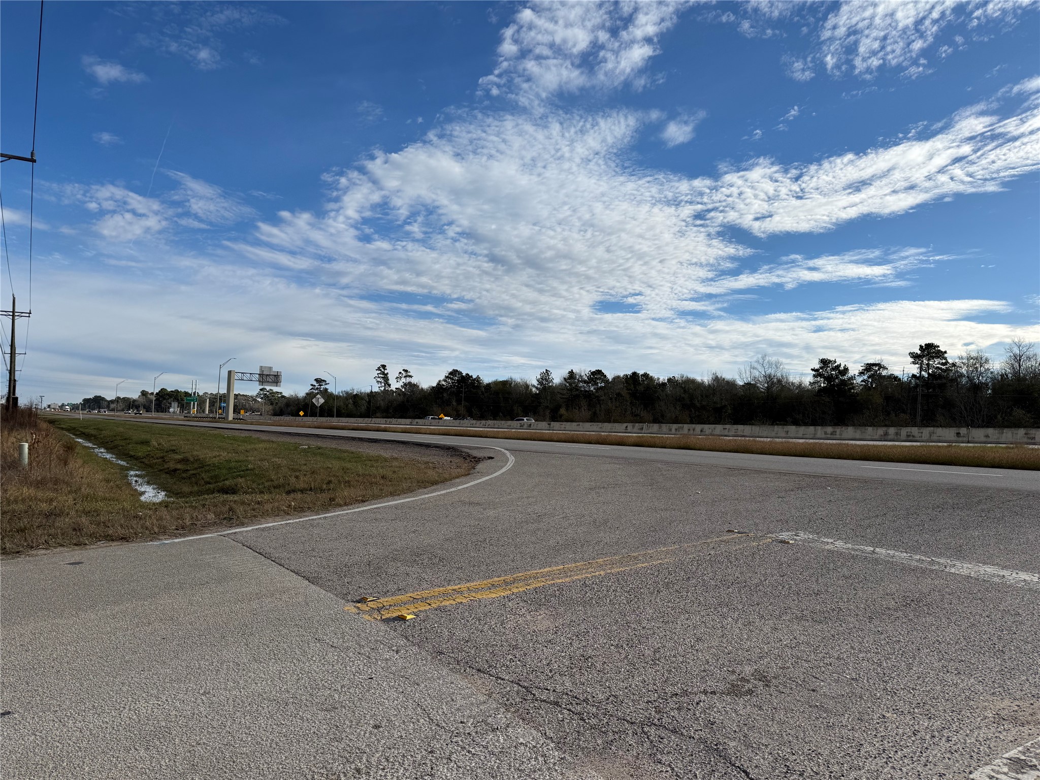 26451 Coleman Drive Splendora, TX 77372 - Photo 1 of 11 a view of a lake