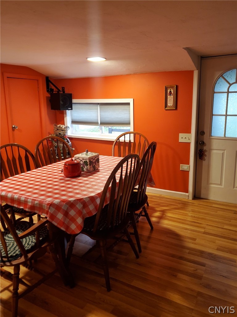1053 Grant Road Russia, NY 13324 - Photo 16 of 47 Warm hardwood flooring anchors this cozy dining ar