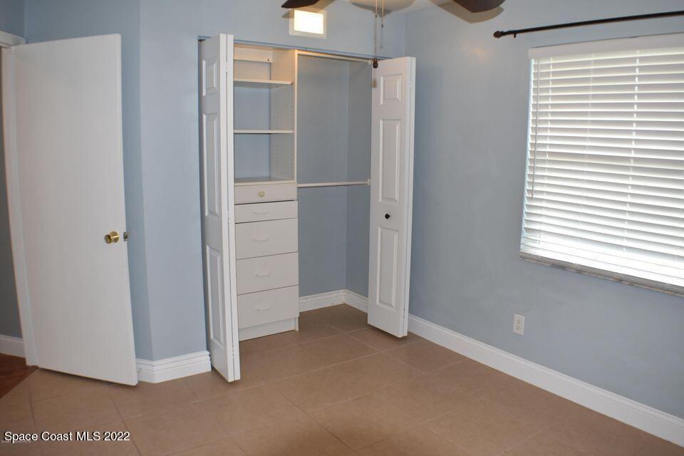 3335 Jay Tee Drive Melbourne, FL 32901 - Photo 18 of 37 a view of an empty room with a window