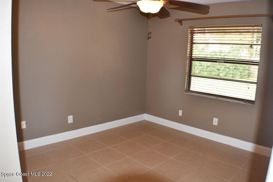 3335 Jay Tee Drive Melbourne, FL 32901 - Photo 24 of 37 a view of an empty room with a window