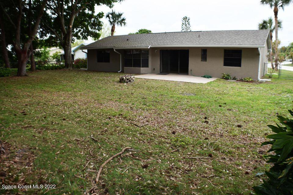 3335 Jay Tee Drive Melbourne, FL 32901 - Photo 27 of 37 a front view of house with yard