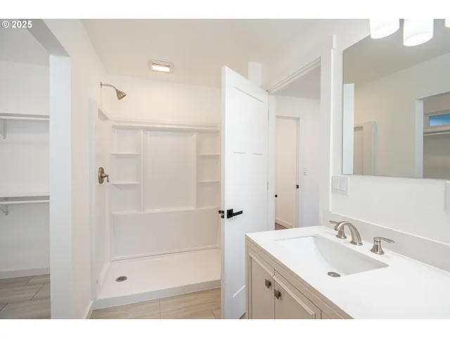 a view of small space with racks on the wall